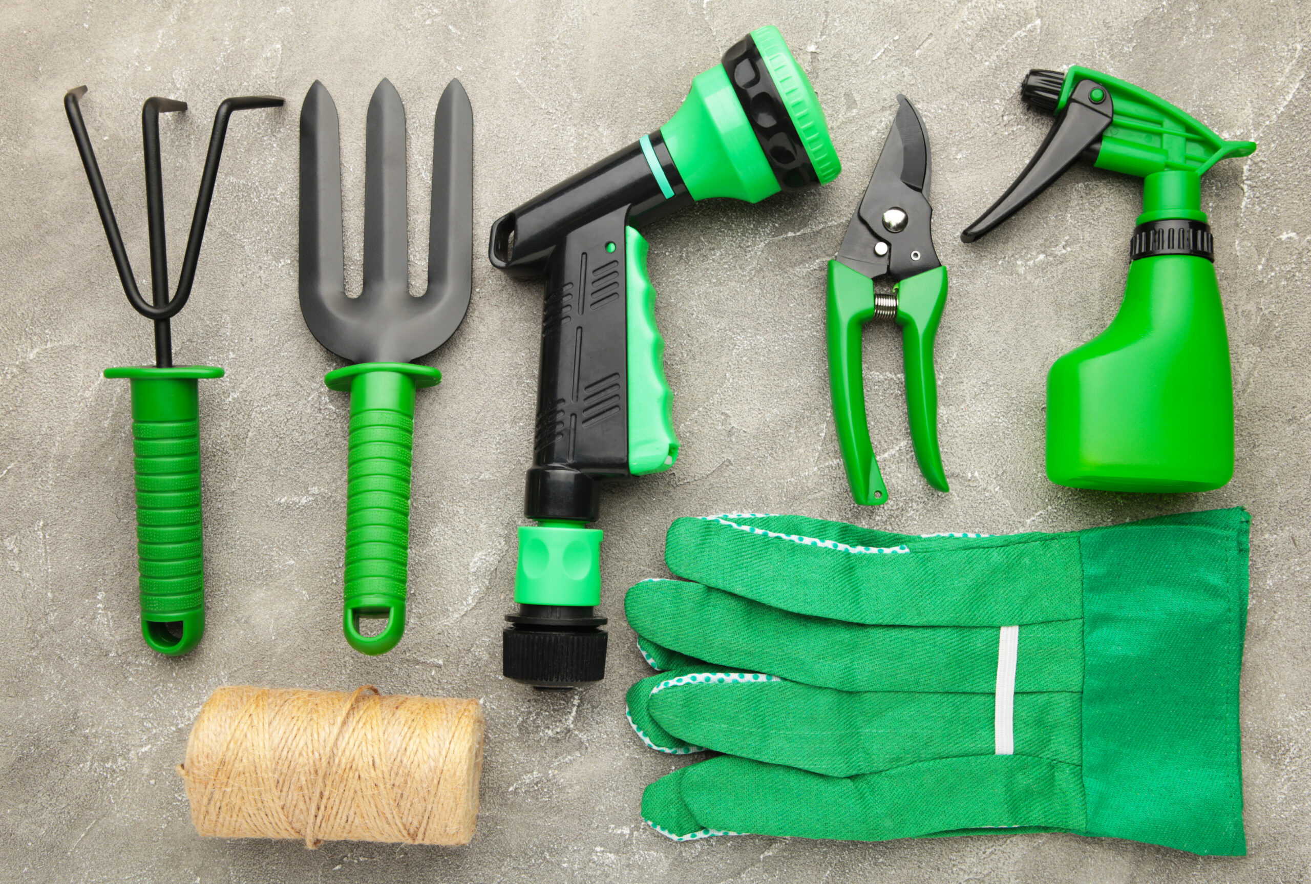 Gardening,Tools,On,Grey,Concrete,Background.,Spring,Concept